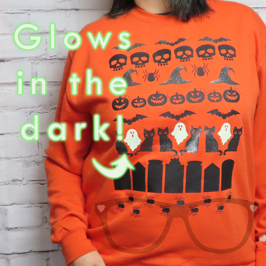 Halloween sweater with glow in the dark ghosts