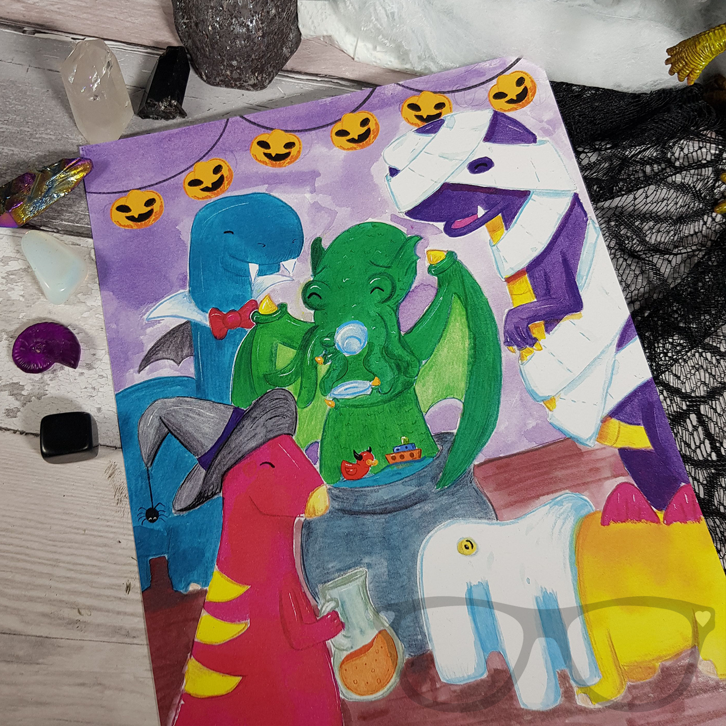 Close up of the A4 Art Print showing the dinosaurs enjoying their spooky party. These A4 sized prints are ideal for displaying in kid's bedrooms, offices or classrooms.