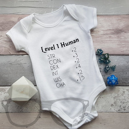 Level 1 human baby body suit, white oprganic baby suit with black heat pressed vinyl design on the front. Ideal gift for geeky, nerdy parents who love to play table top games such as DnD or Pathfinder