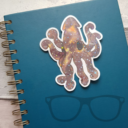 Octopus vinyl sticker on notebook