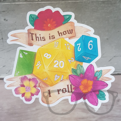 This is how I roll glossy vinyl sticker. Three different types of dice all rolling high surrounded by text that says "This is how I roll". 